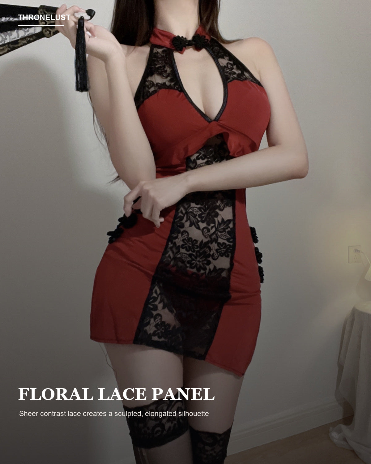 Close-up of the sheer floral lace center panel on the Midnight Bloom red mini dress.